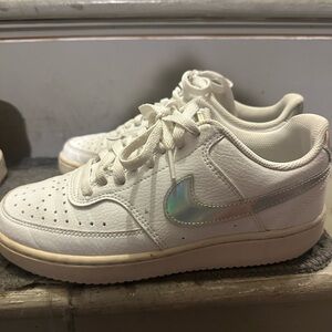 Nike White Sneakers with Silver Swoosh